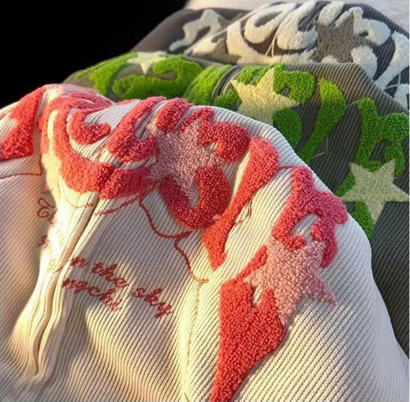 Embroidered "TROUBLE" Zip-Up